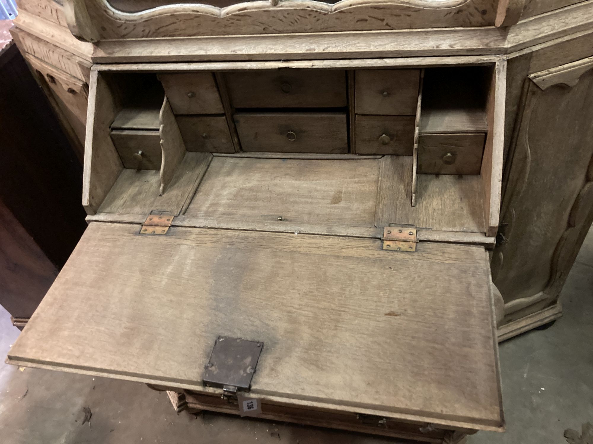 A mid 18th century Dutch bleached oak bureau cabinet, length 155cm, depth 56cm, height 216cm